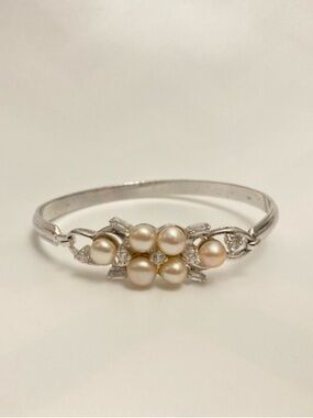 PRETTY pearlescent and diamond like silver tone formal hook closure bracelet